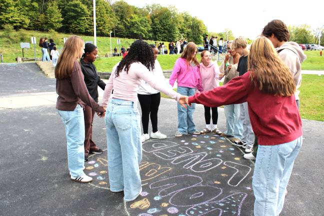 Chester Academy students participate in the ‘Chalk about Love’ campaign to raise awareness about teen dating violence.