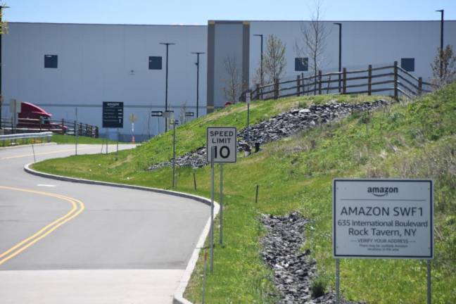 One of two entrances to the new Amazon warehouse, where at full capacity about 800 people will work alongside mobile robots to pack bulky goods such as patio furniture and outdoor equipment.