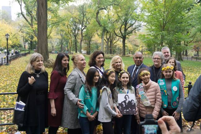 U.S. Rep. Carolyn Maloney, center, joined with the Manhattan Borough president, Gale Brewer, third from left, and the Park's Department's commissioner, Mitchell Silver, fourth from right, and Girl Scouts to announce plans for the placement of a monument honoring the suffragists Elizabeth Cady Stanton and Susan B. Anthony in the Central Park Mall. Photo: Sophie Herbut