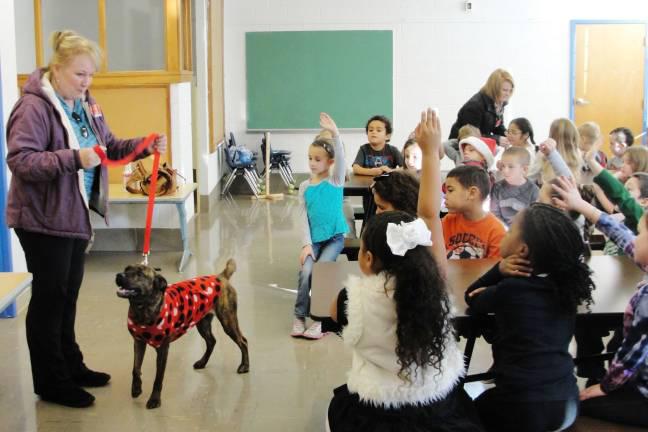 Goshen Humane Society’s Susan Bossley visits Scotchtown Avenue School in 2014. File photo.