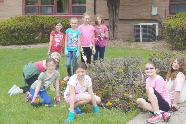 From back to front, Carly Lindeman, Lily Pawliczak, Kayla Scramm, Christina Diorio, Savannah Smith, Maria Kelly, Kaitlyn Byrne, Ava Kaloz, and Danielle Fiumara.