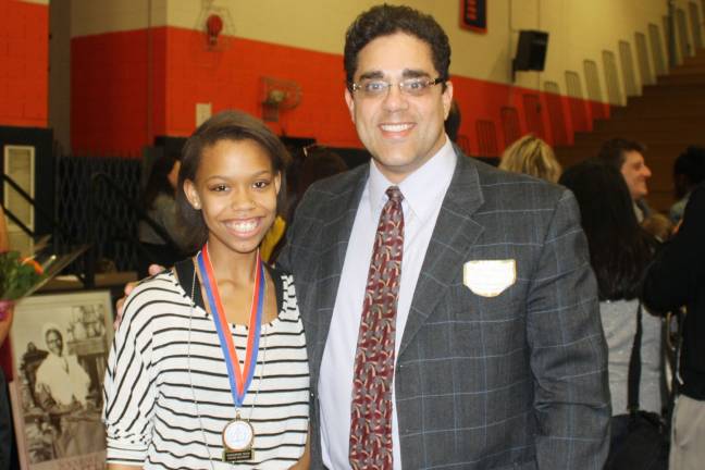Laura Daniels and Principal William Rolon.