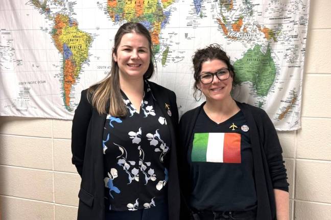 Chester Elementary School Principal Mary Kate Boesch (right) shows her Irish pride with event organizer Emily Daunicht, Chester Elementary School art teacher.
