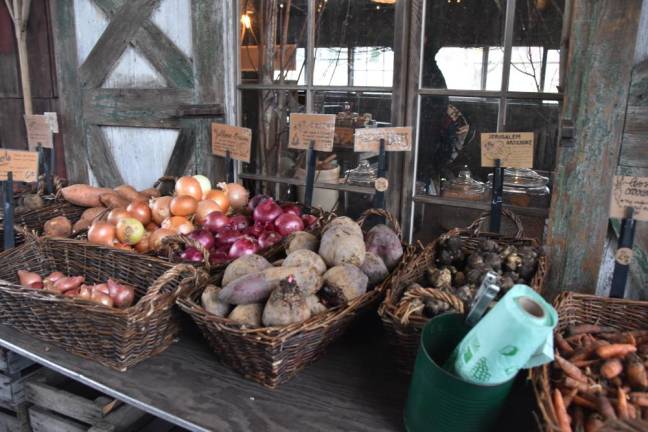 Blooming Hill Farm Market was well stocked with root veggies from the root cellar and greens and herbs from the greenhouse.