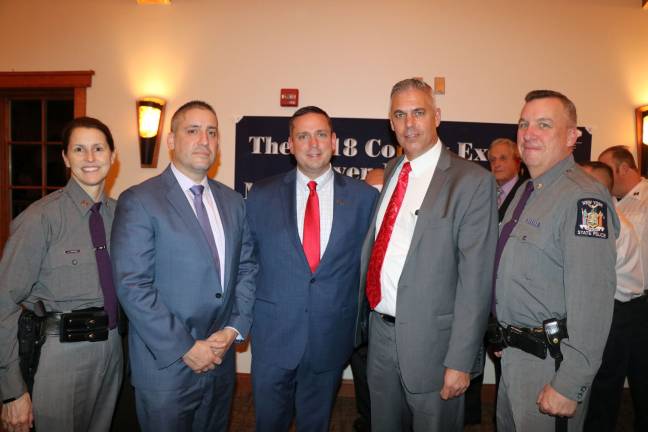 State Police Troop F Captain Jennifer Gottstine, Investigator Joseph Lofrese, Neuhaus, Investigator Yan Salomon and Major Pierce V. Gallagher, Commander of Troop F (Photo provided)