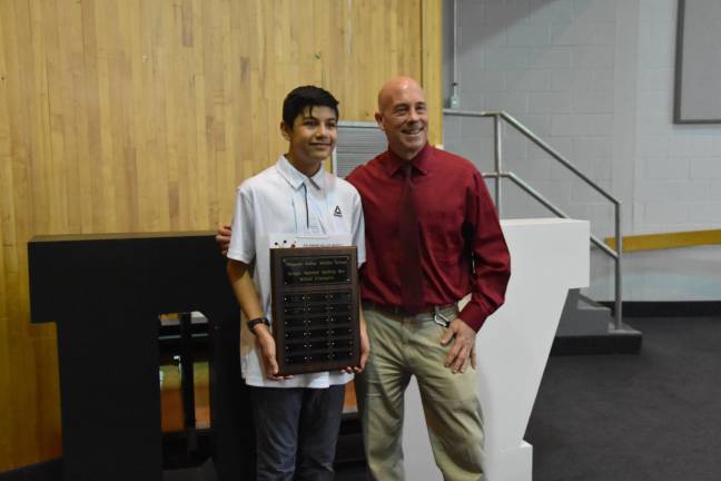 Seventh-grader Eddie Arias with Delaware Valley Middle School Principal Dr. Pete Ioppolo. Arias won the middle school bee on Jan. 12; he is a past winner of the elementary school bee.
