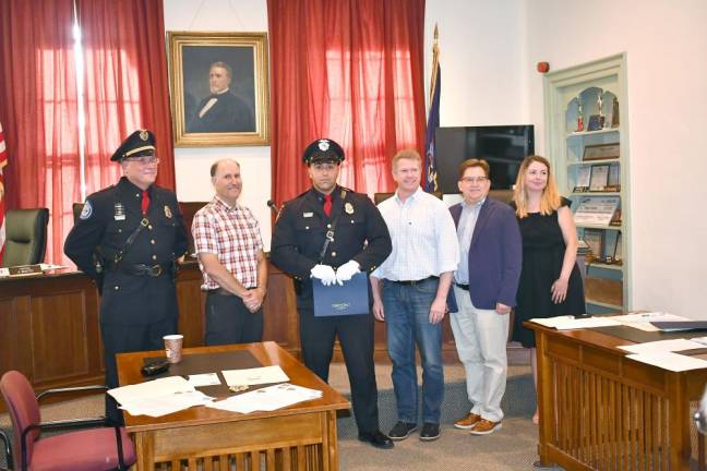 Left to Right, Chief James Watt, Trustee Tony Scotto , Ptl. Anthony A. Pirillo, who delivered a baby; Mayor Scott Wohl, Trustee Jonathan Rouis, Police Commissioner Molly O’Donnell.