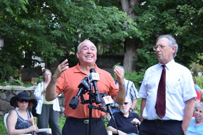 Restauranteur Israel Campos speaks as attorney Michael Sussman looks on (Photo by Erika Norton)