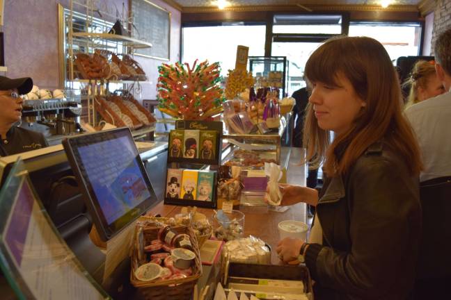Rachel Van Tosh, deputy commissioner for the city&#x2019;s small business services, orders at La Maison du Macaron. Photo: Genia Gould