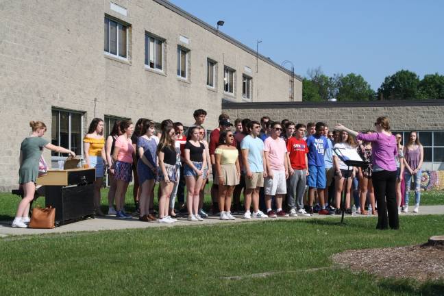 Goshen High School choral students sing “The Star Spangled Banner.” (Photo provided)