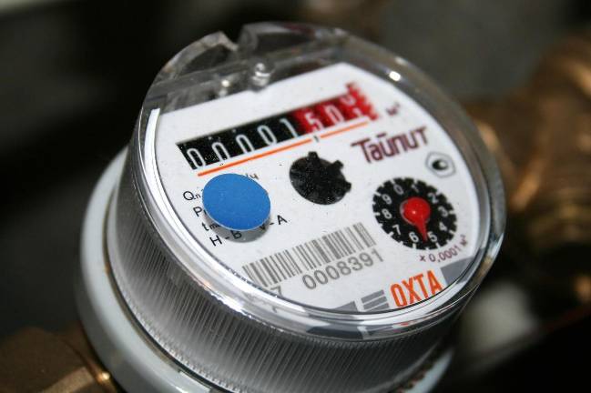 Opt-out fees for new water meters examined