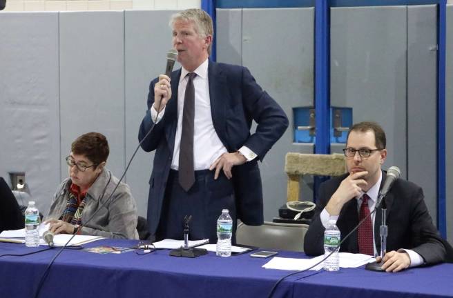 Manhattan District Attorney Cyrus Vance (standing) explained his office&#x2019;s response to the recent increase in reported hate crimes at a community event March 23. Photo: Michael Garofalo