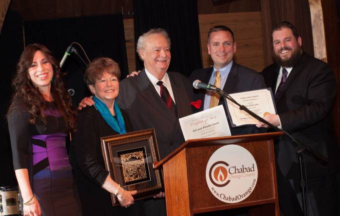 Chabad Honorees Gil and Phyllis Goetz of Monroe receive the Leadership Award. Pictured with Rabbi Pesach and Chana Burston and County Executive Steve Neuhaus.