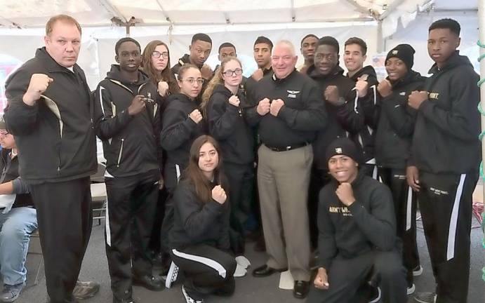 Suresky Auto's General Manager Jeff Musumeci front and center, is surrounded by the West Point Boxing team, led by Coach Ray Barone.The team competed in Boston over the weekend and decided to reroute their bus on the trip back to USMA for a stop off at the Veterans Day luncheon at Suresky's Auto. They tried to teach Musumeci a few moves, but he said he would stick with his day job at Suresky's.