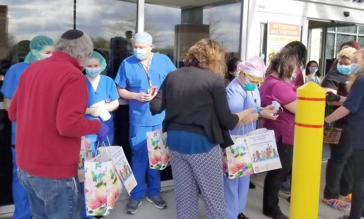 Chabad distributes care packages to caregivers at Orange Regional Medical Center at Chabad’s Honk for Heroes Car Parade.