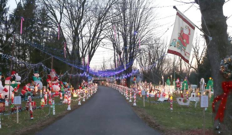 With more than 50,000 lights and music, no Town of Warwick home has attracted more tourists at Christmastime than the home of Vincent Poloniak on Spanktown Road in Florida, N.Y. Photo by Roger Gavan.
