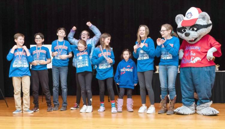C.J. Hooker Middle School's Classics...The Effective Detective Division 2 team wins first place. Left to right: Ethan Tetzlaff, Nathan Hulse, Cole Florio, Carly Seligman, Roxanne Aclin, Isabel Barnhorst, Jordan Seligman, Julia McKenna, Coach Heidi Seligman. The team also won a Ranatra Fusca Creativity Award for demonstrating outstanding creativity.