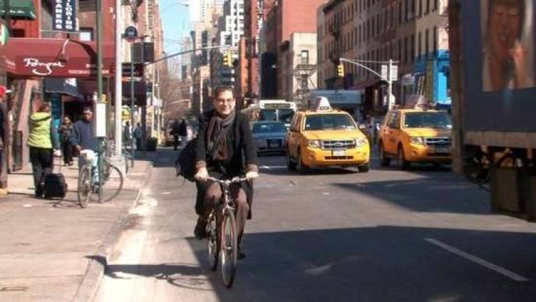 Famed gossip columnist Michael Musto riding down Lexington Avenue in the East 20s. Photo: Streetfilms &#x201c;Il Ciclista Dolce: Michael Musto&#x201d; screen shot