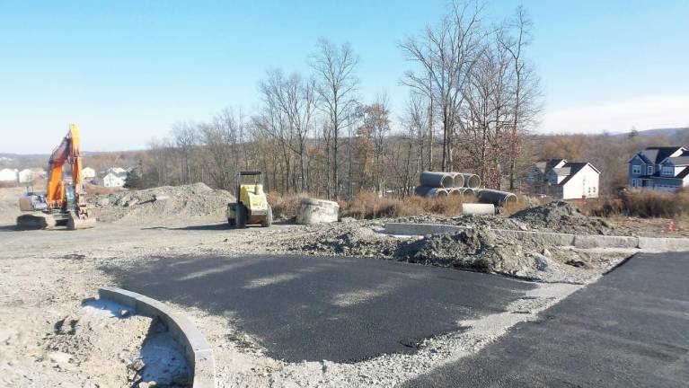 Road construction continues last week at Harness Estates.