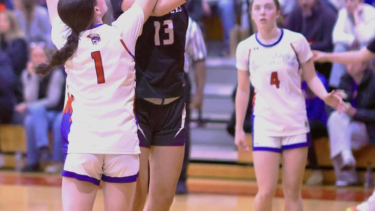 Monroe-Woodbury’s Gianna Pacciarelli drives to the basket in Goshen on Jan. 23.