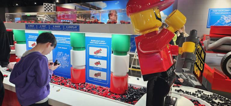 Guests can build their own Ferrari-inspired LEGO car.