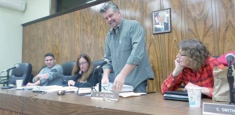 The town board last Wednesday night: Councilman Orlando Perez, Town Clerk Linda Zopallo, Supervisor Bob Valentine, and Councilwoman Cindy Smith. Councilmen Ryan Wensley and Vincent Finizia were absent.