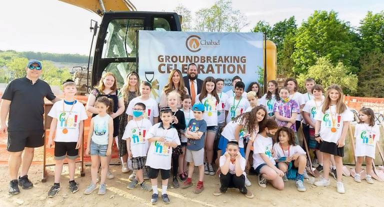 Chabad Hebrew School students, some pictured here, celebrated their accomplishments of this past year and look forward to their new Hebrew School building next year at the Chabad Campus Groundbreaking Celebration.
