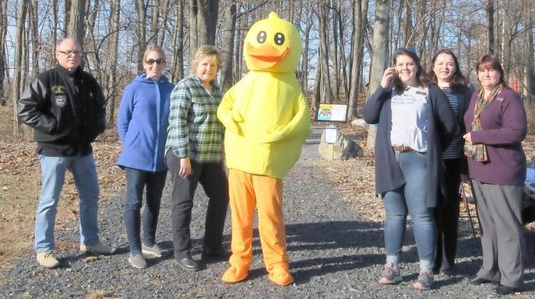 From left: library trustees Allen Herschman and Kerry Cambria, children's librarian Joni Armstrong, Webster the Duck, outreach librarian Emily Wilson; Ramapo Catskill Library System executive director Grace Riario