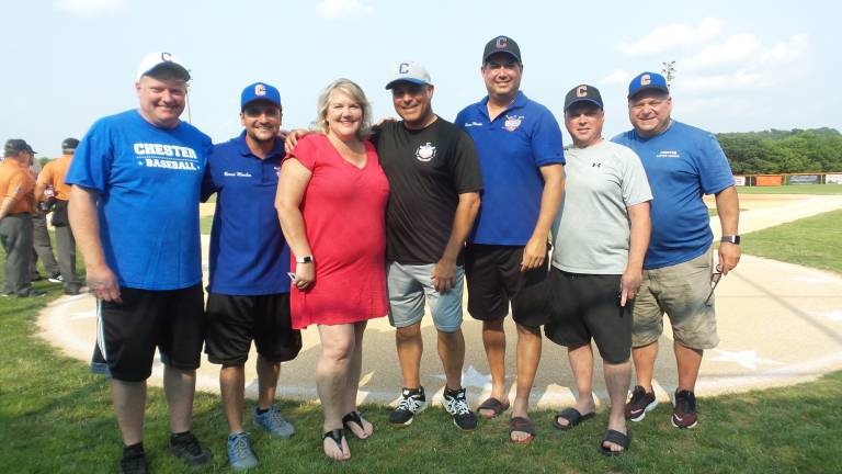 From left: Dan Lusigman, volunteer; Anthony Donadio, vice-president of the Chester Little League; Jeanne Lusignan and Joe Laura, co-cordinators of the New York State tournament; Jeff Gati, Chester Little League; Jim Malone, former little league board member; and and Carl D&#x2019;Antonio, treasurer of the Chester Little League. All are former or current members of Chester Little League. (Photo by Frances Ruth Harris)