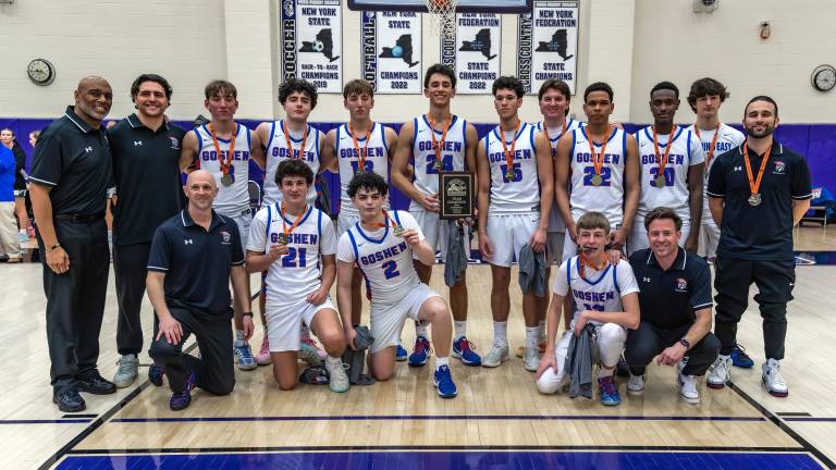 The Goshen Gladiators celebrate their section championship.