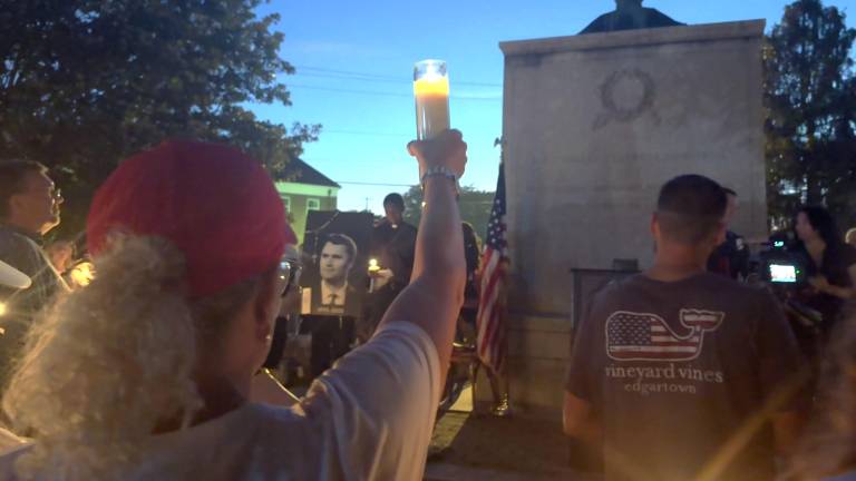 People paid tribute to activist Charlie Kirk in Village
