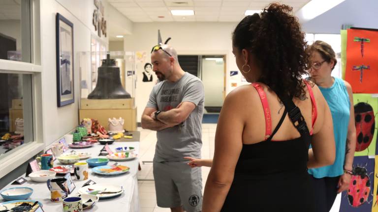Guests check out some of the art on display at the Chester Academey STEAM Expo.