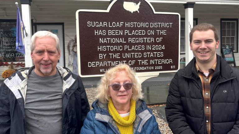 Bill Rossiter, Lydia Cuadros and Chester Town Supervisor Brandon Holdridge in front of the new historic marker.