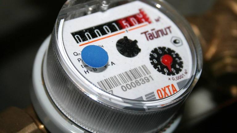 Opt-out fees for new water meters examined