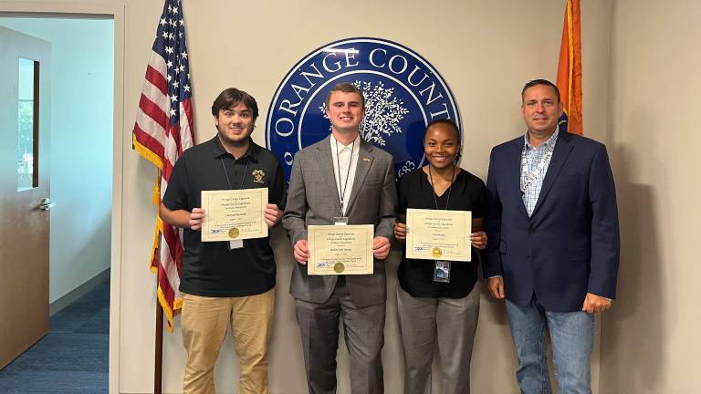 Orange County Executive Steve Neuhaus poses with participants from the 2025 internship program.