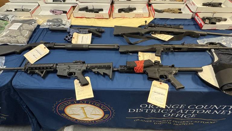 Guns, drugs and money confiscated as part of Operation Powder Burn.