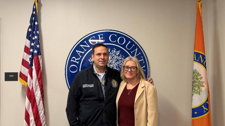 Orange County Executive Steve Neuhaus with incoming Budget Director Gretchen Riordan.