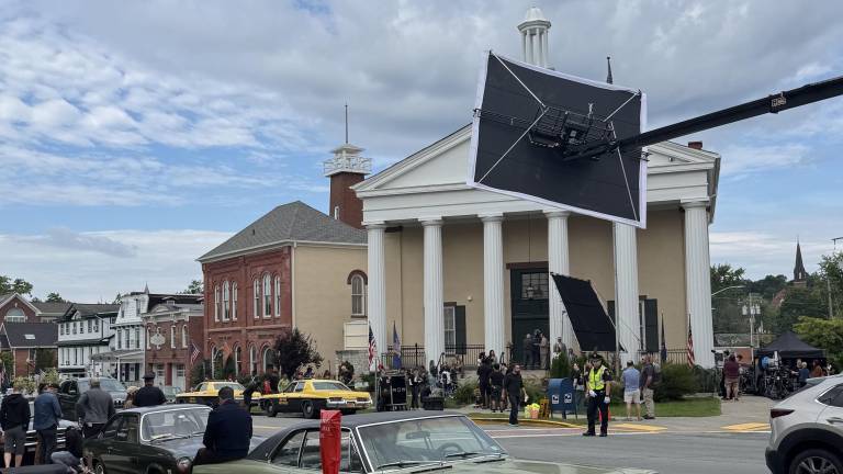 Film crews outside the 1870 Courthouse on Main Street in Goshen.