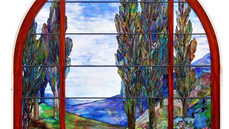 “Cypress and Azalea,” the stained-glass window originally created for the Rushmore mansion, is expected to be auctioned for $300,000 to $500,000 at Christie’s next week.