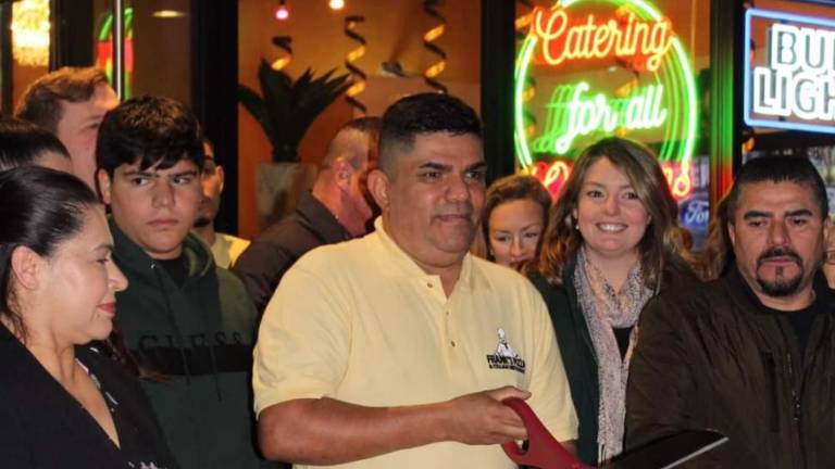 Carlos Cucina II owner Carlos Morales with Goshen Mayor Molly O’Donnell at the ribbon cutting ceremony Nov. 29. Photo provided.
