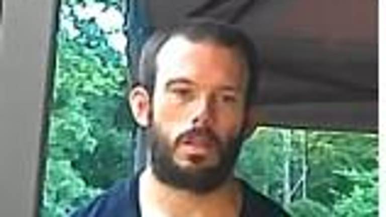 Murder suspect Thomas Ryan, 32, of Greenville, was arrested shortly after midnight Sunday.