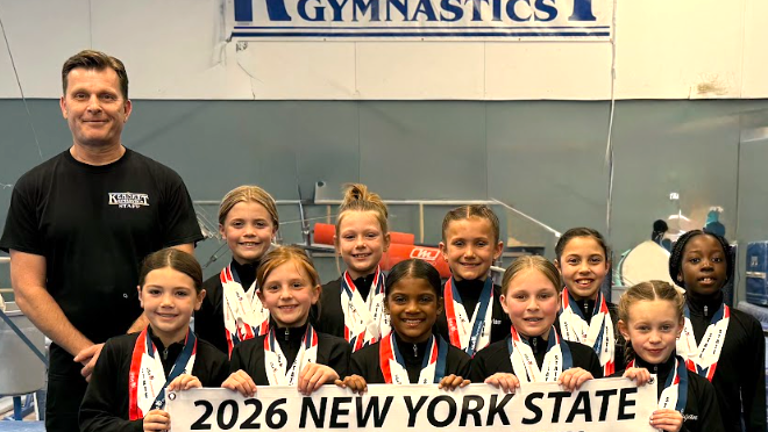Kennett Xcel Bronze team. Front (L to R) – Cameron Marino, Orlagh Browne, Amari Simpson, Abby Avener and Logan Schlosser. Back (L to R) – Coach John Smales, Kinsley Kendrick, Lily Sternkopf, Dylan Gaffney, Gabby Figueroa and Eliana-Grace Asante-Boateng.