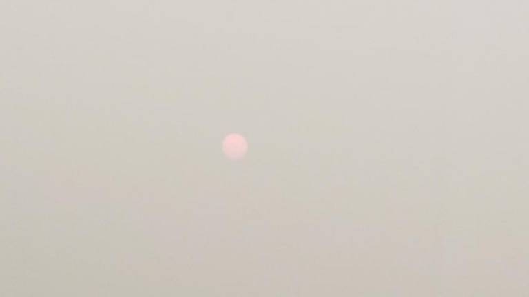 Despite weather apps predicting the day to be mostly sunny, areas affected by the Canadian smoke saw a hazy, dull sun on Tuesday and Wednesday. Photo: Ann Marie Vitoulis